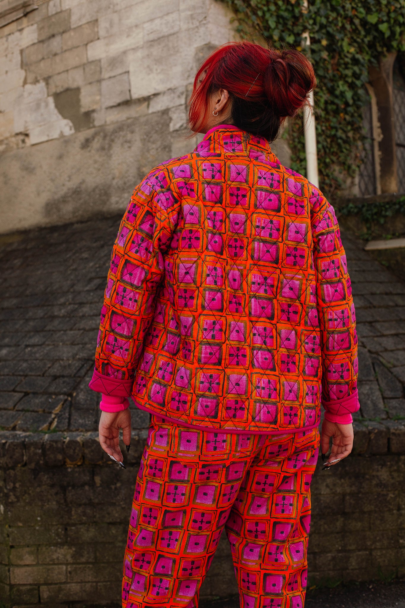 Short Quilted Jacket in 'Divine & Conquer'