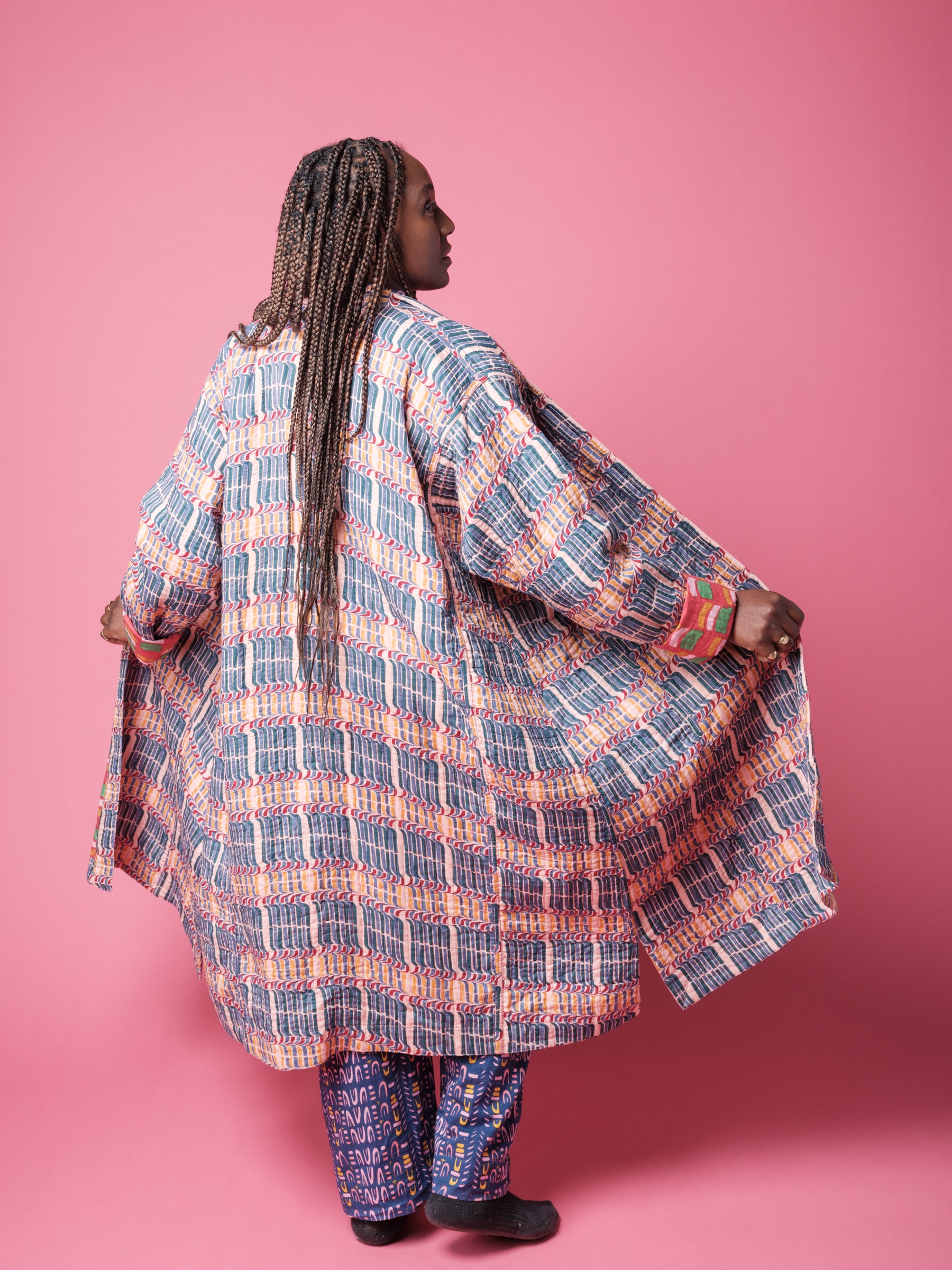 Unisex Quilted Housecoat in 'Stick of Rock' & 'Red Citrus Segment'