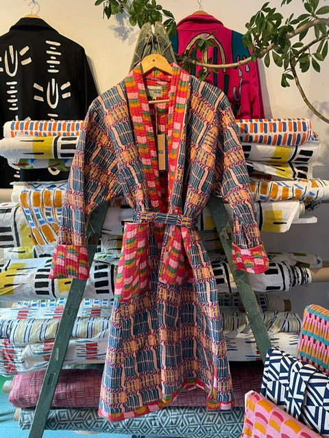Unisex Quilted Housecoat in 'Stick of Rock' & 'Red Citrus Segment'