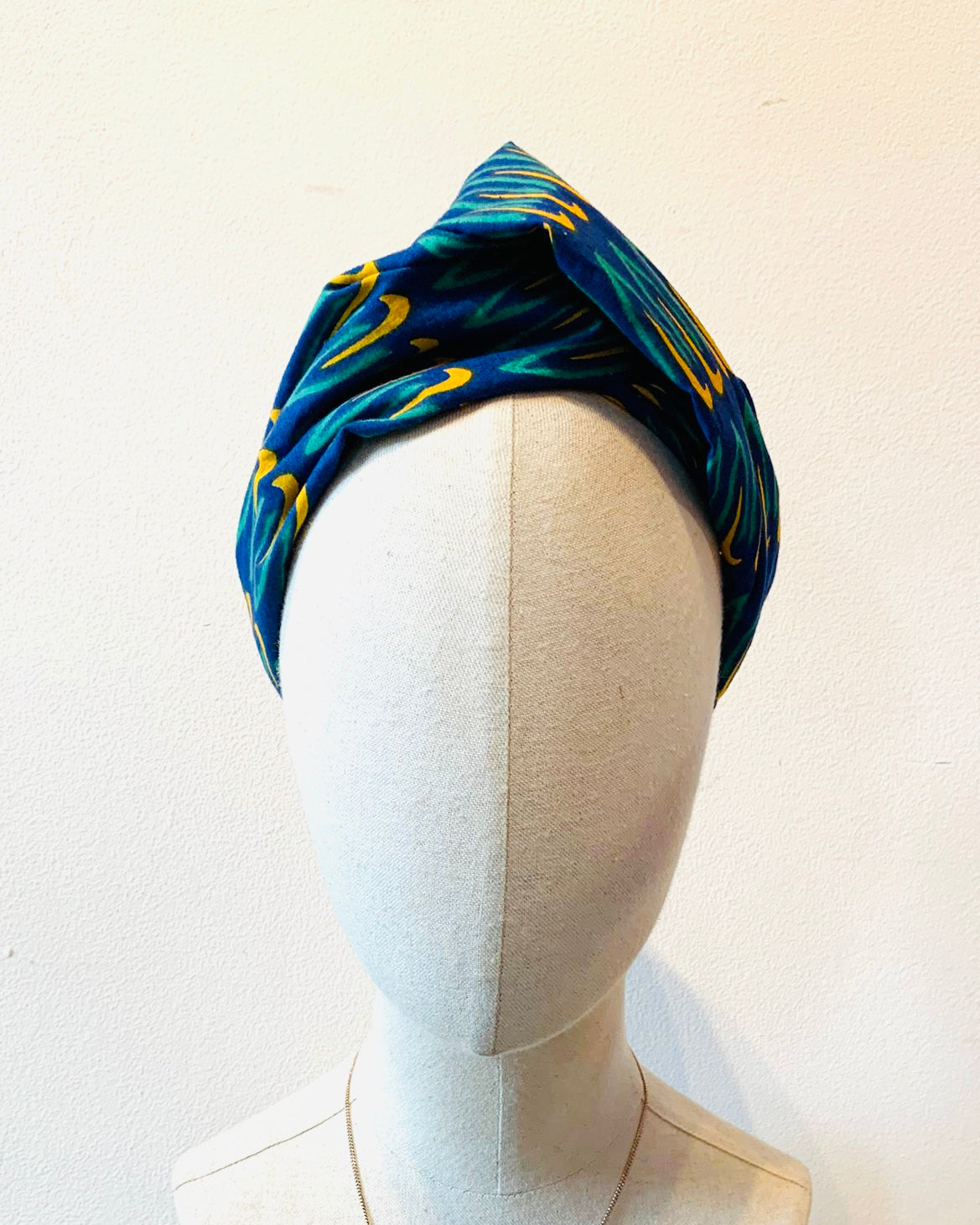The Twist Headband in 'Winter Fly'