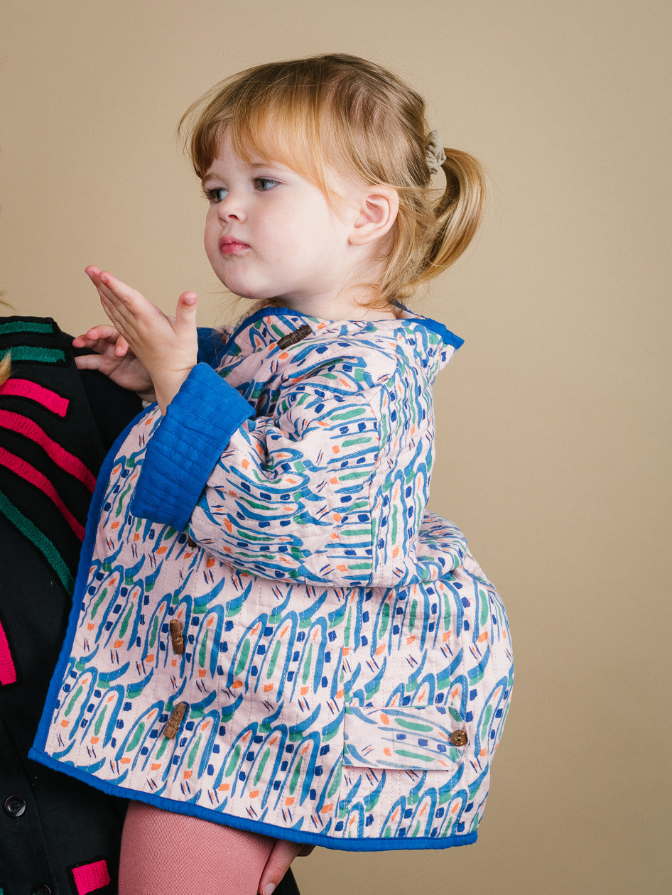 Kids organic cotton quilted Jacket in Hungry Bugs on Pink-Humphries and Begg