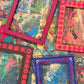 Colorful art frames on a textured surface