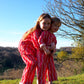 Kid's Playsuit in 'Pink Spark'