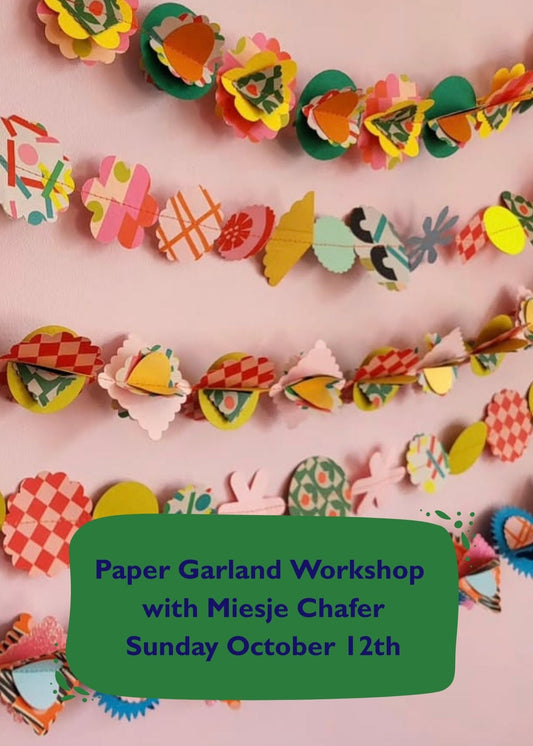 Colorful paper garland on a pink background with text for a workshop.