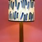 Hand painted lamp in Top and Tail by Claire Cartwright Studio-Humphries and Begg