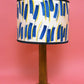 Hand painted lamp in Top and Tail by Claire Cartwright Studio-Humphries and Begg