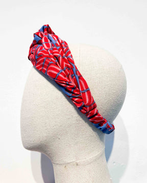 The Twist Headband in Flamingo Splits on Blue